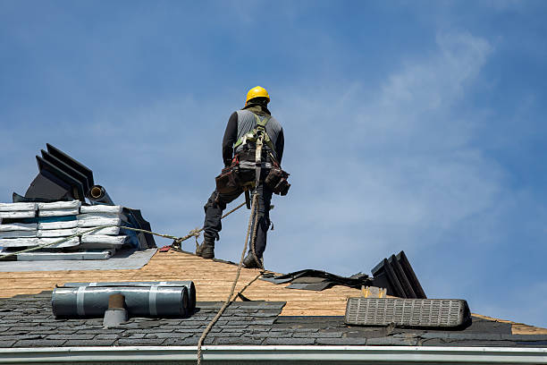 Professional Roof Replacement technician working in Hereford, OR